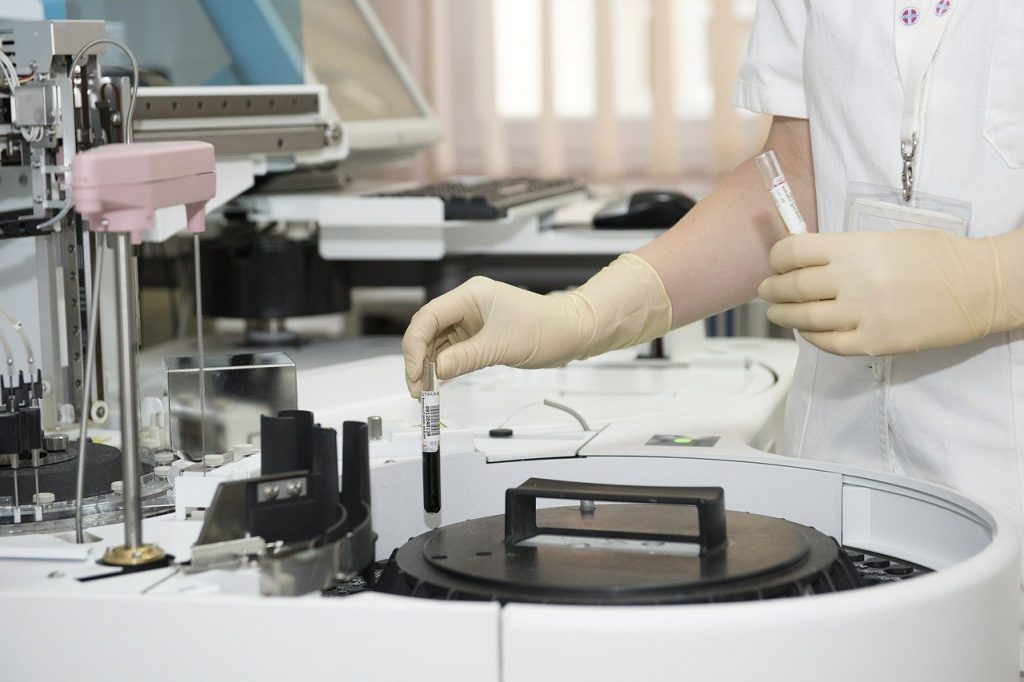 laboratory test tubes healthcare worker 563423