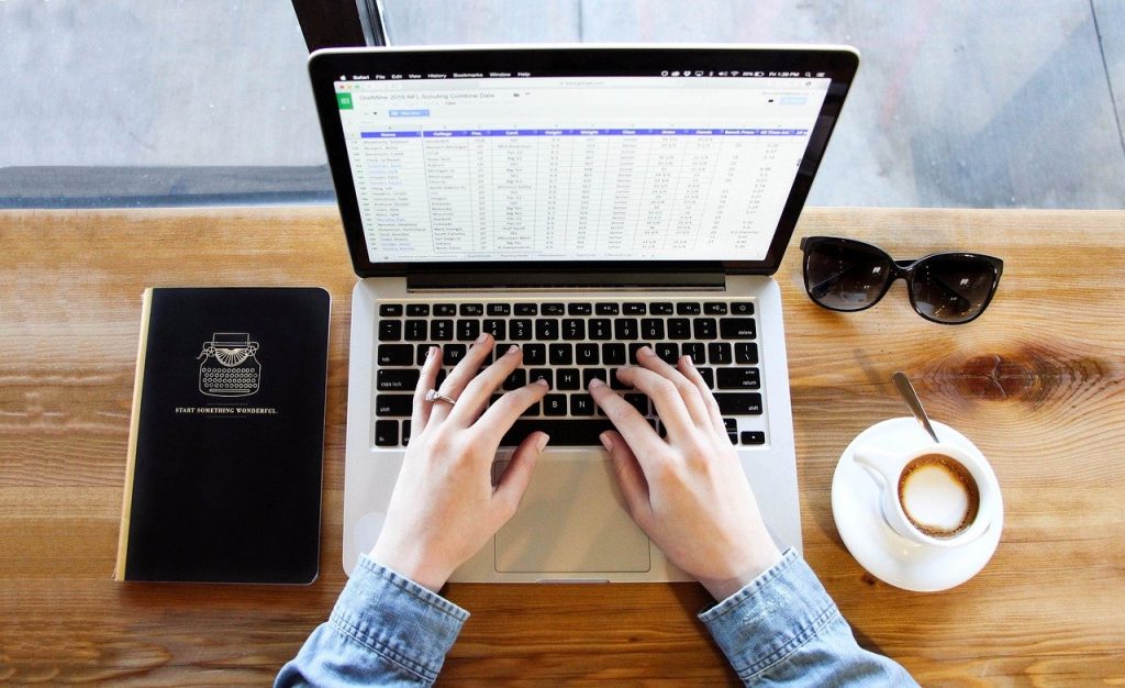 notebook typing coffee 1850613