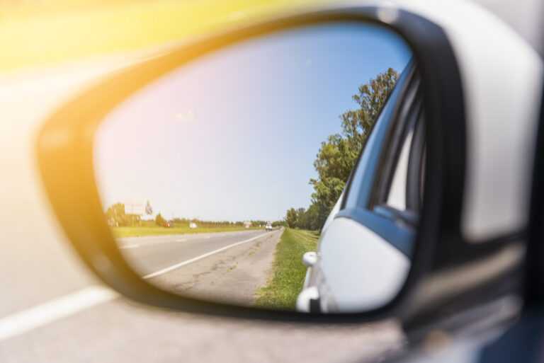 road reflected side mirror